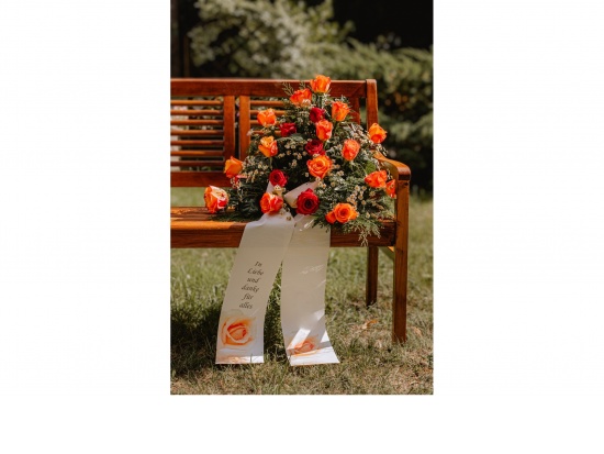 Gesteck orange u. rote Rosen Nr.8